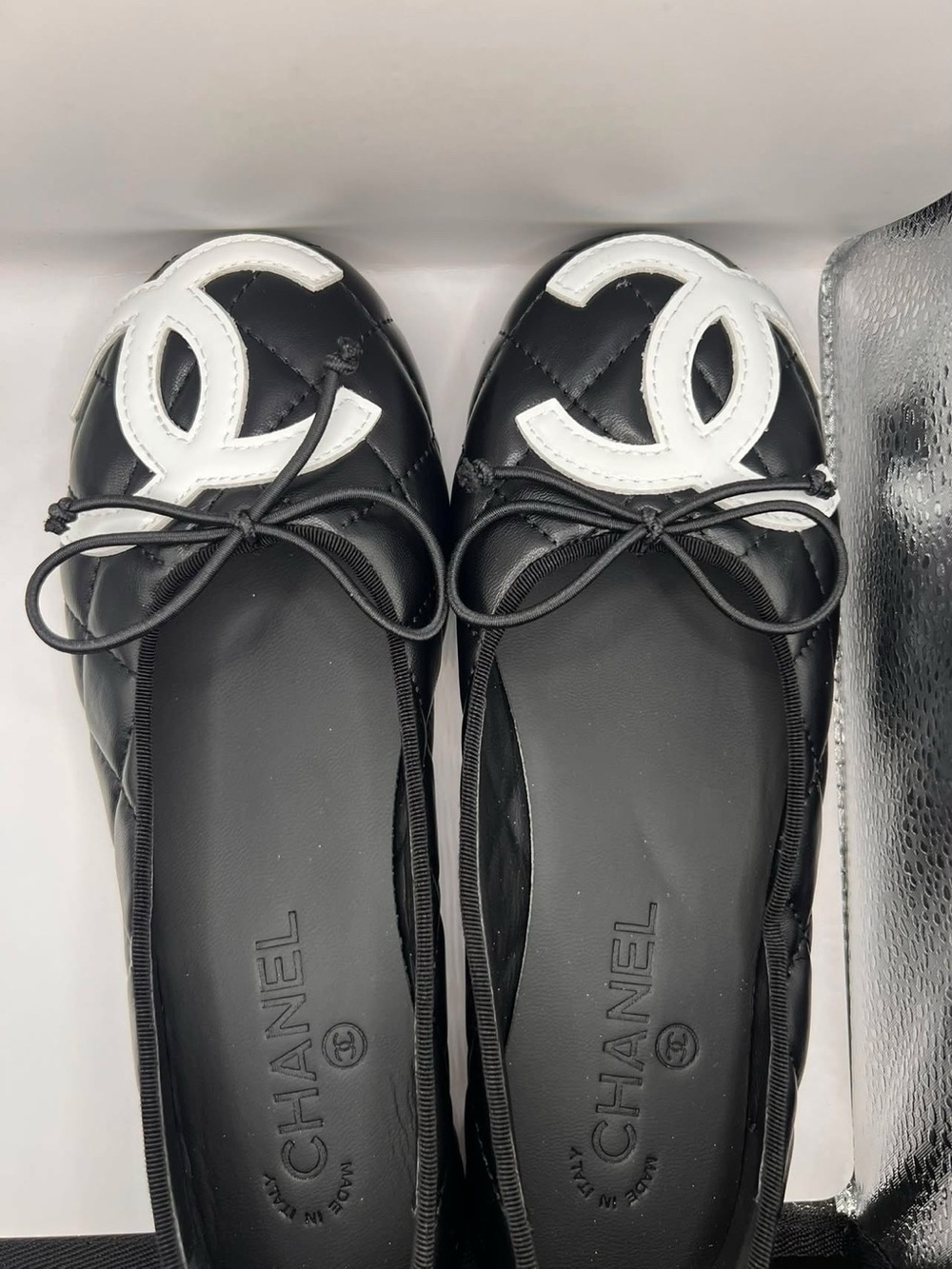 Black Quilted Leather Ballet Flats with White CC Logo